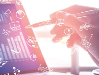 a hand holding a pen