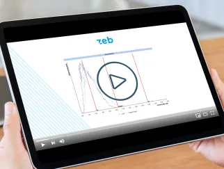 a hand holding a tablet