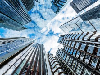 looking up view of tall buildings