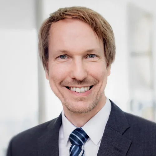 a man in a suit and tie