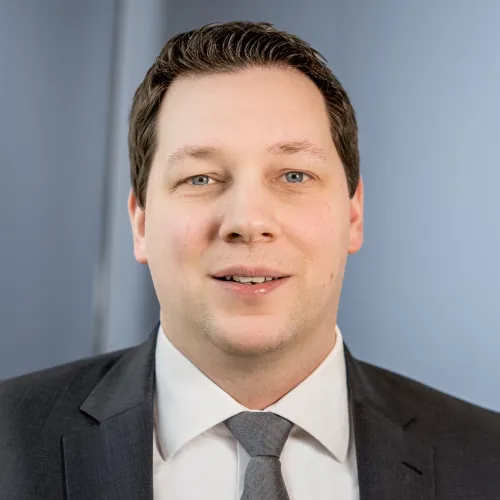 a man in a suit and tie